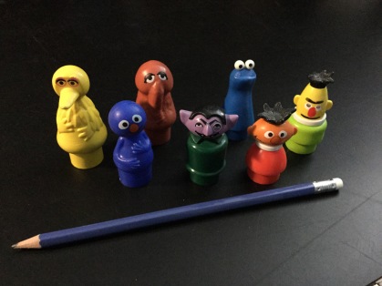 Fisher-Price Sesame Street Little People: Big Bird, Grover, Snuffleupagus, The Count, Cookie Monster, Ernie and Bert. 